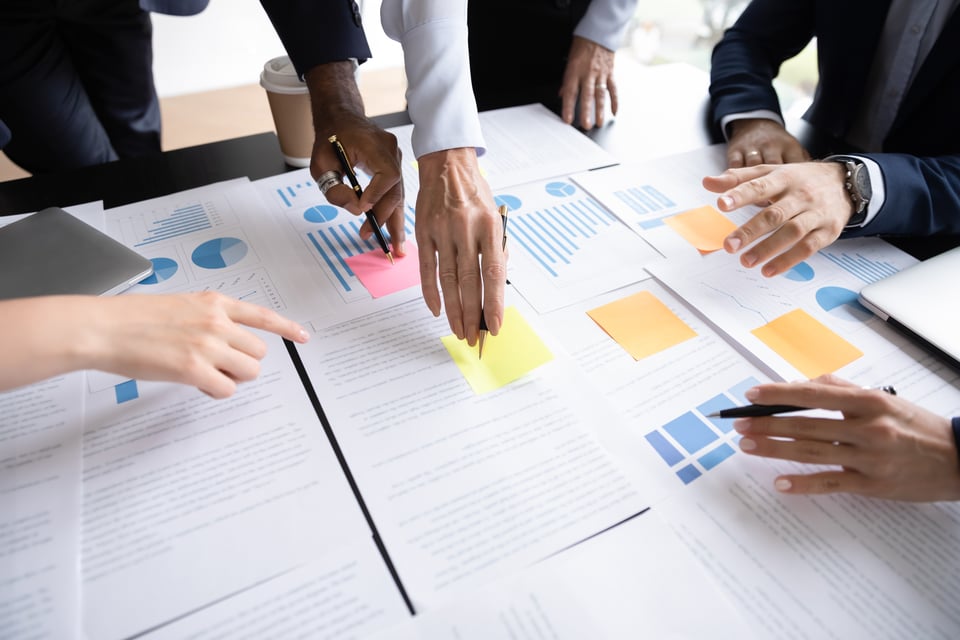 Corporate team uses data analytics to improve procurement strategy amid rising inflation.
