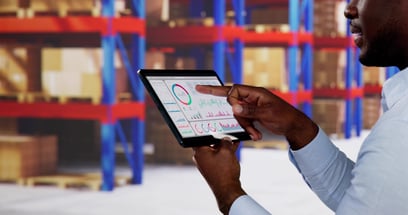 Procurement specialist tracks and manages office supply inventory using cloud-based technology.